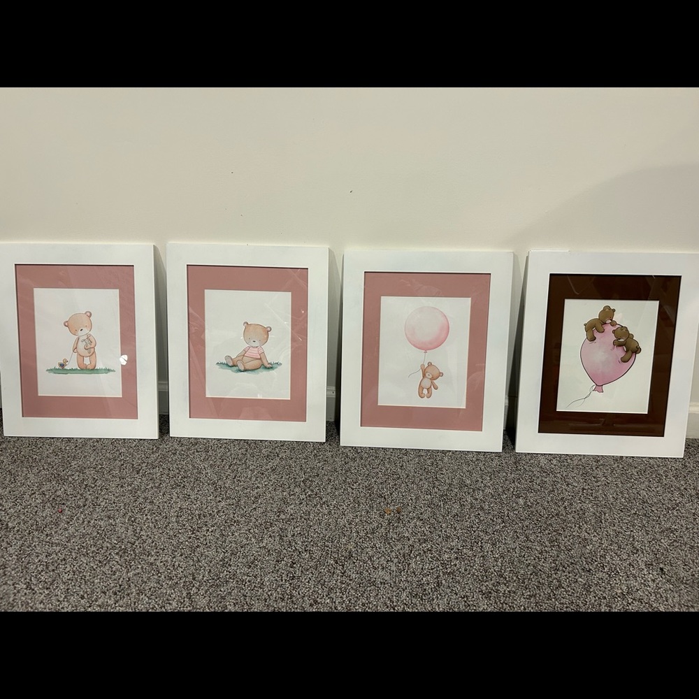 Nursery room wall photos.
